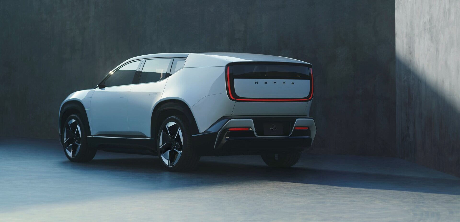 de achterkant van de honda 0 suv